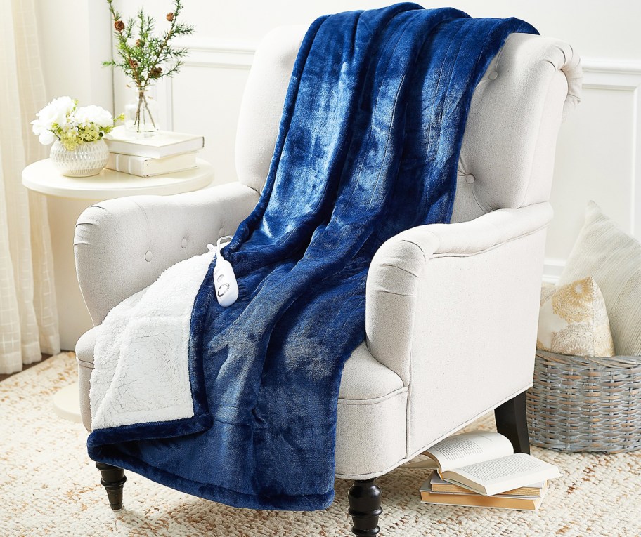 blue heated throw on chair