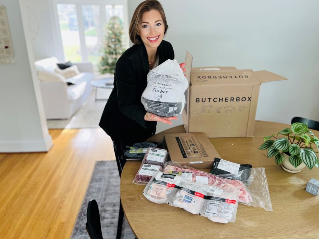 woman holding a Butcher Box turkey