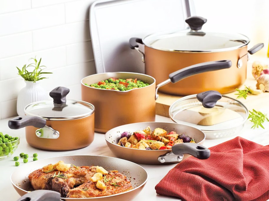 copper cookware set on kitchen counter