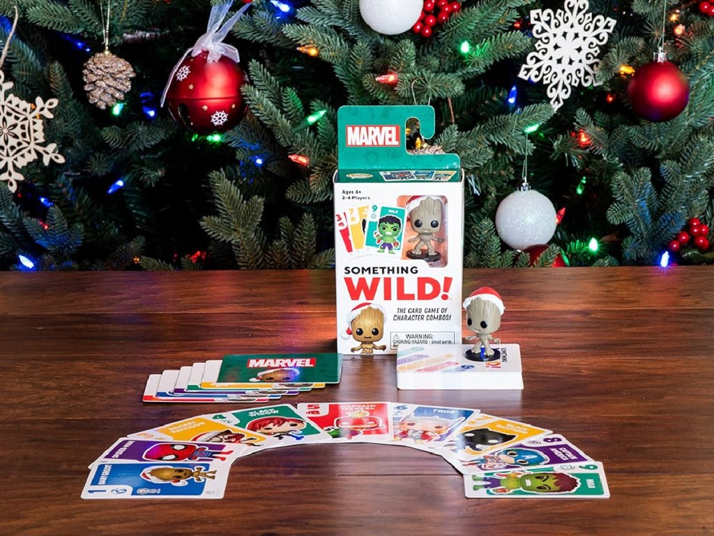 Funko Something Wild! Guardians of The Galaxy Holiday Card Game  with Christmas tree behind ut