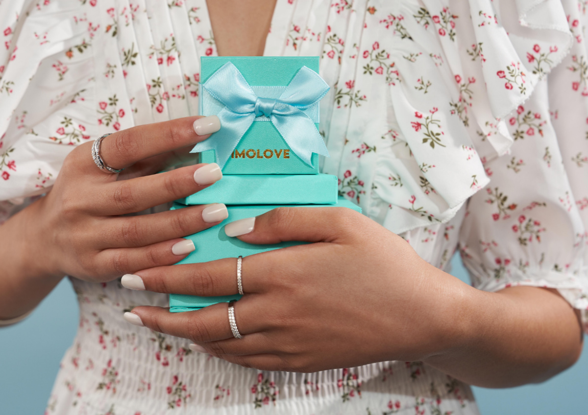 woman holding gift boxes