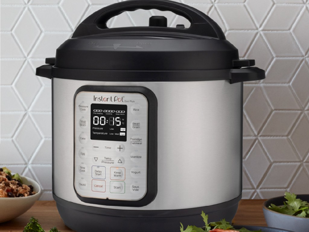  Instant Pot Duo Plus 9-in-1 Electric Pressure Cooker on table