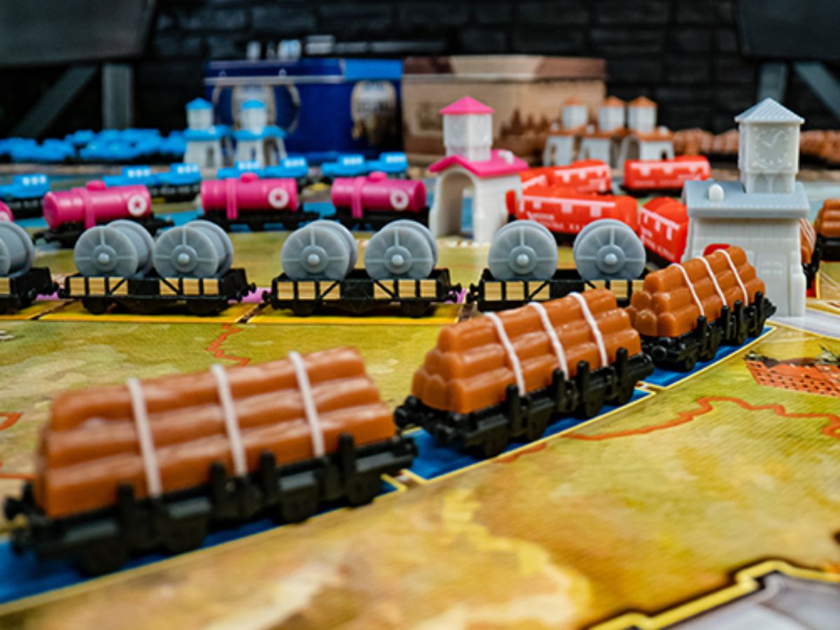 Close up of trains and stations from Ticket to Ride Europe 15th Anniversary Edition