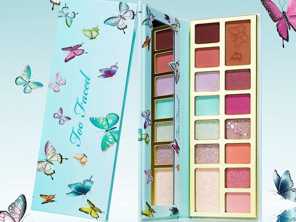 blue too faced eyeshadow palette with butterflies around it