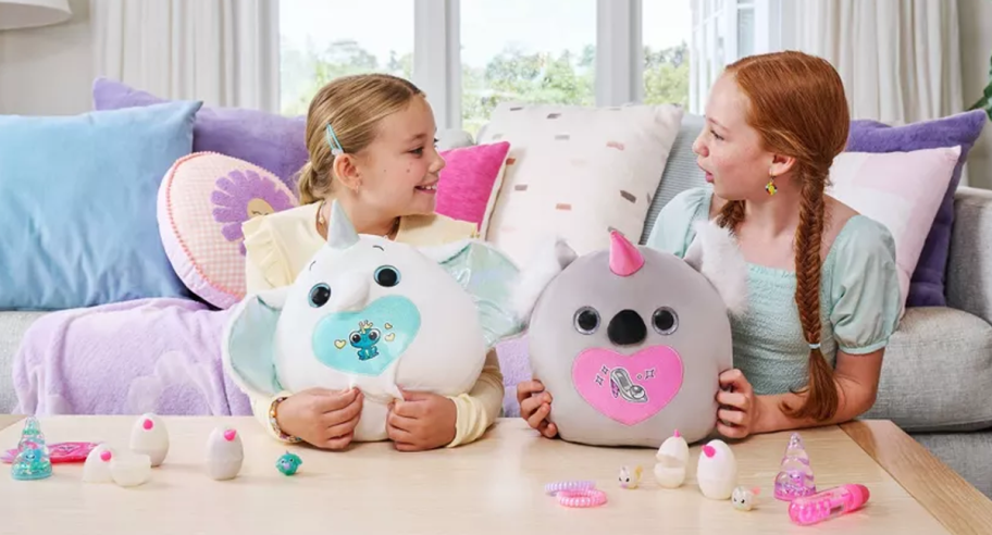 Two girls playing with Rainbocorns Eggzania Fairy Mania