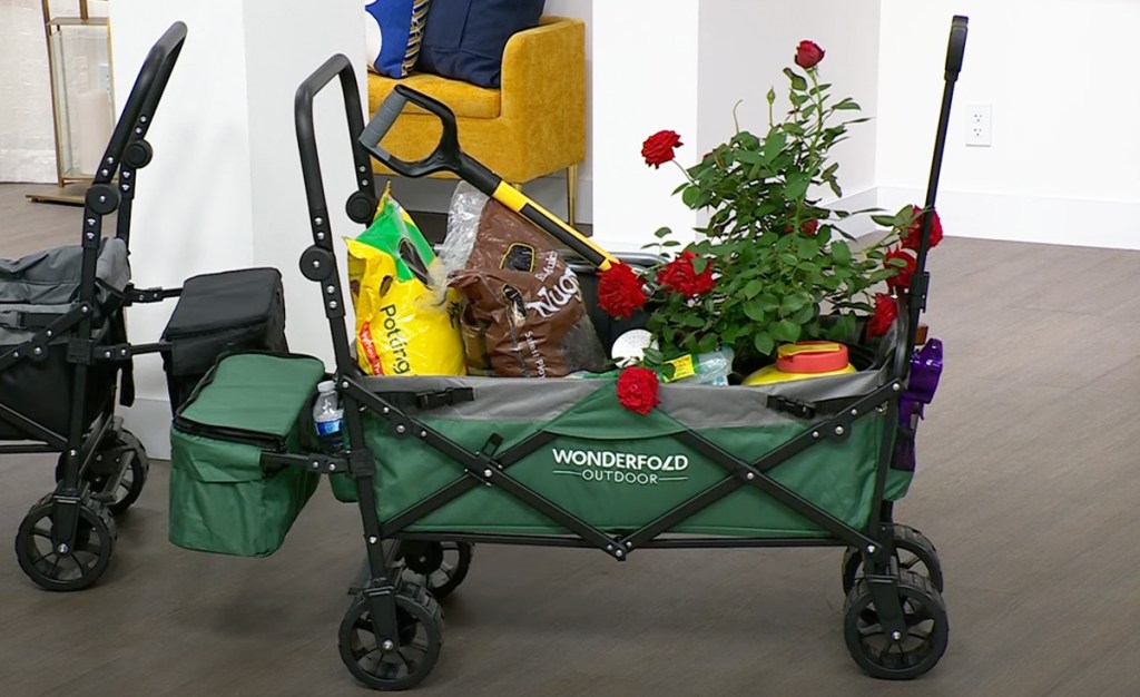 plants and garden soil inside green wonderfold wagon
