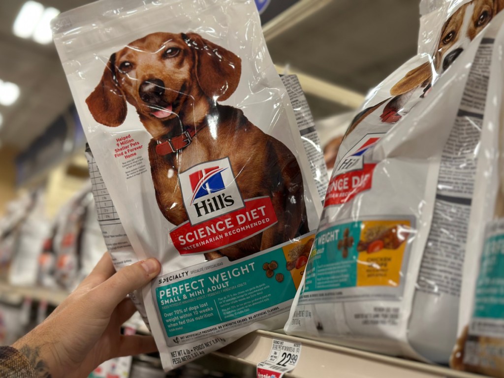 pulling dog food of shelf