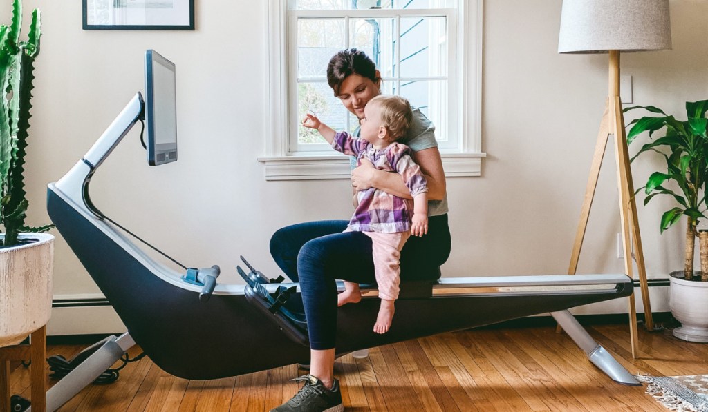 woman and child on hydrow machine