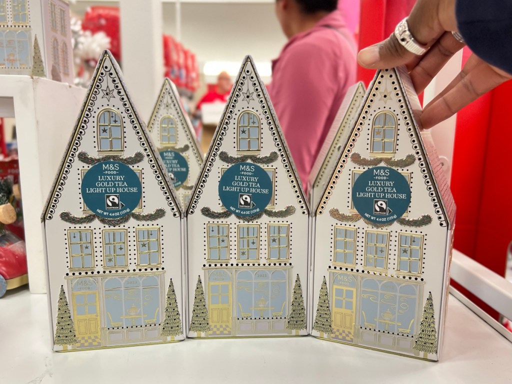 3 tea tins shaped like houses