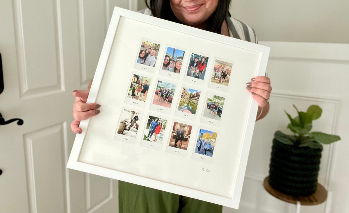 woman holding frame