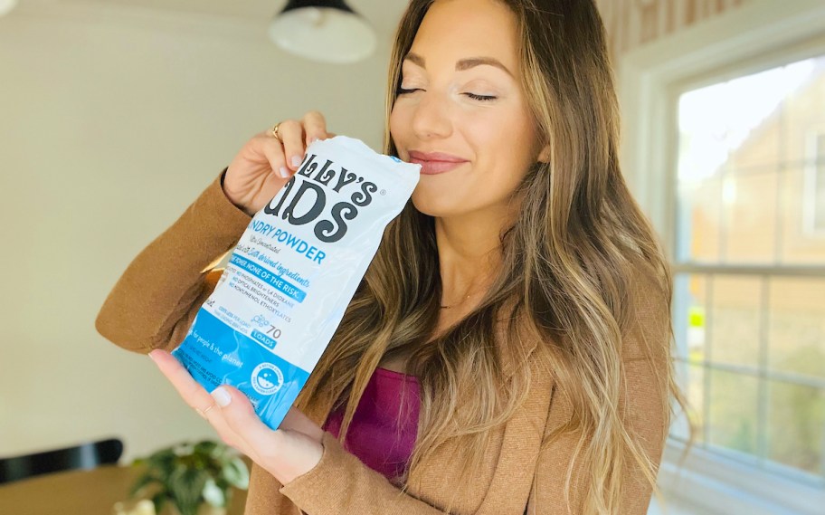 woman smelling bag of mollys suds