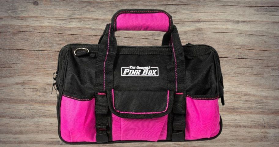 the original pink box bag on wood