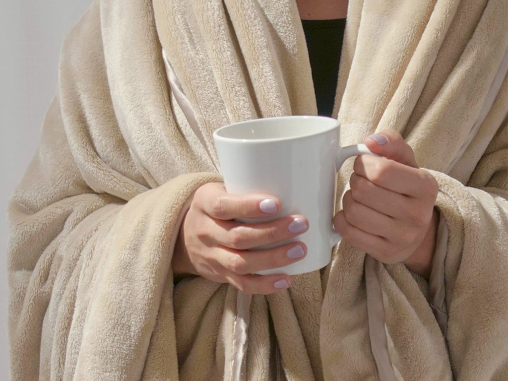 woman with weighted blanket