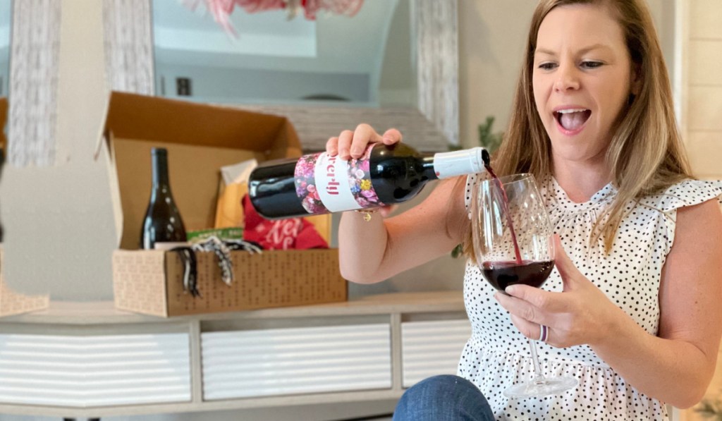 woman pouring glass of wine