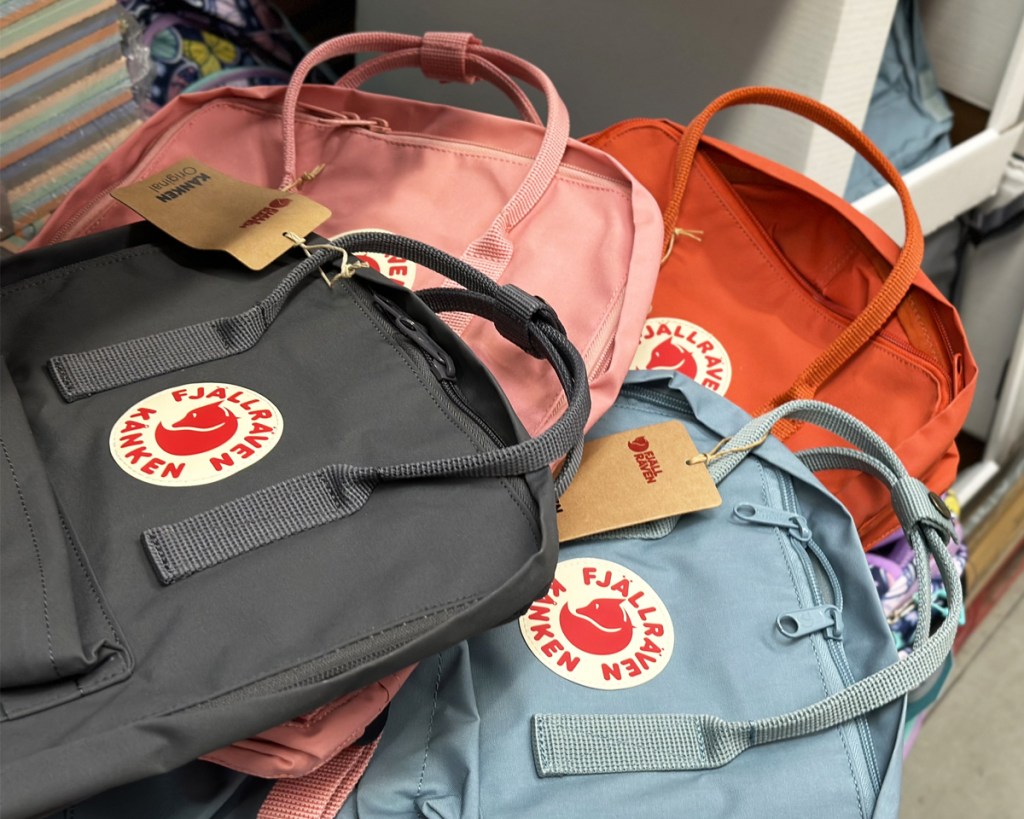 stack of kanken backpacks in store