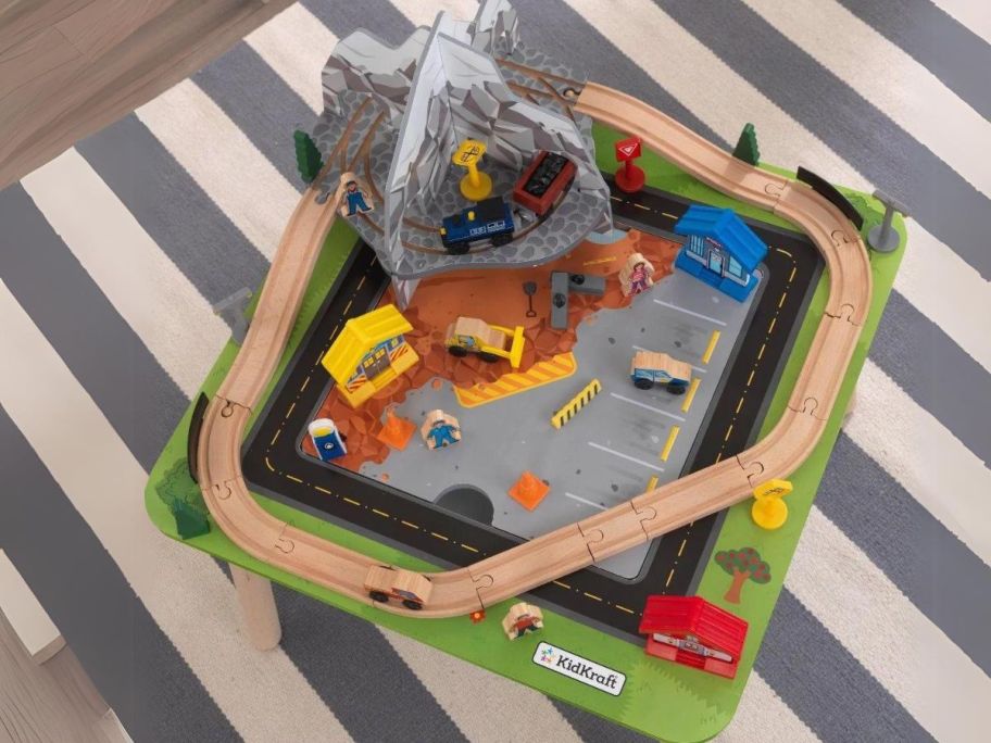 KidKraft Rocky Mountain Wooden Train Set & Table w/ 50 Accessories in playroom