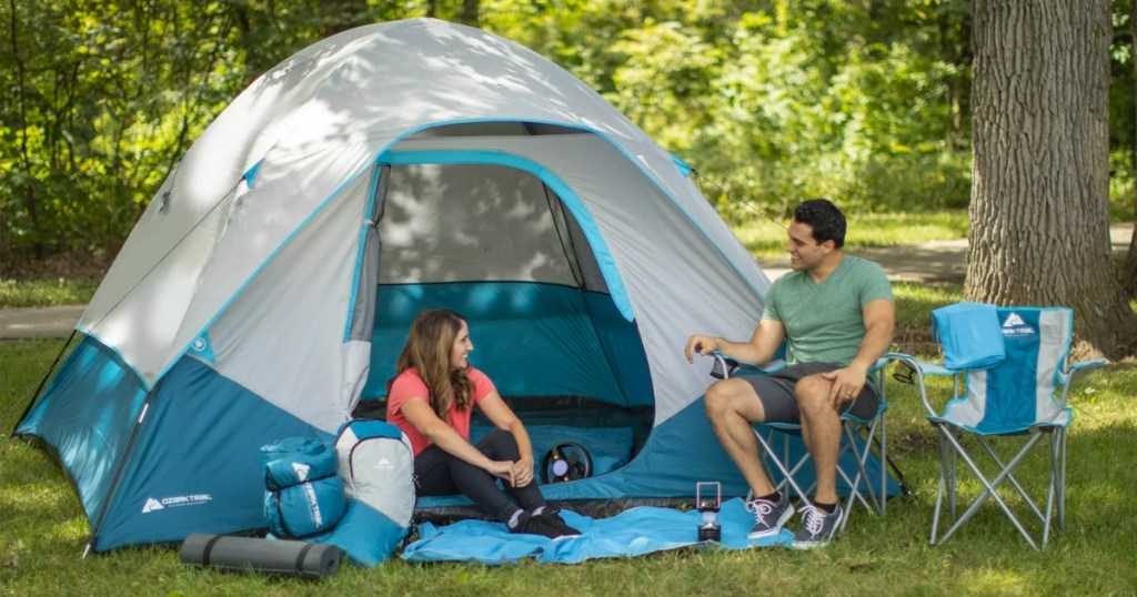 people camping with an Ozark Trail 28-Piece Camping Tent Set