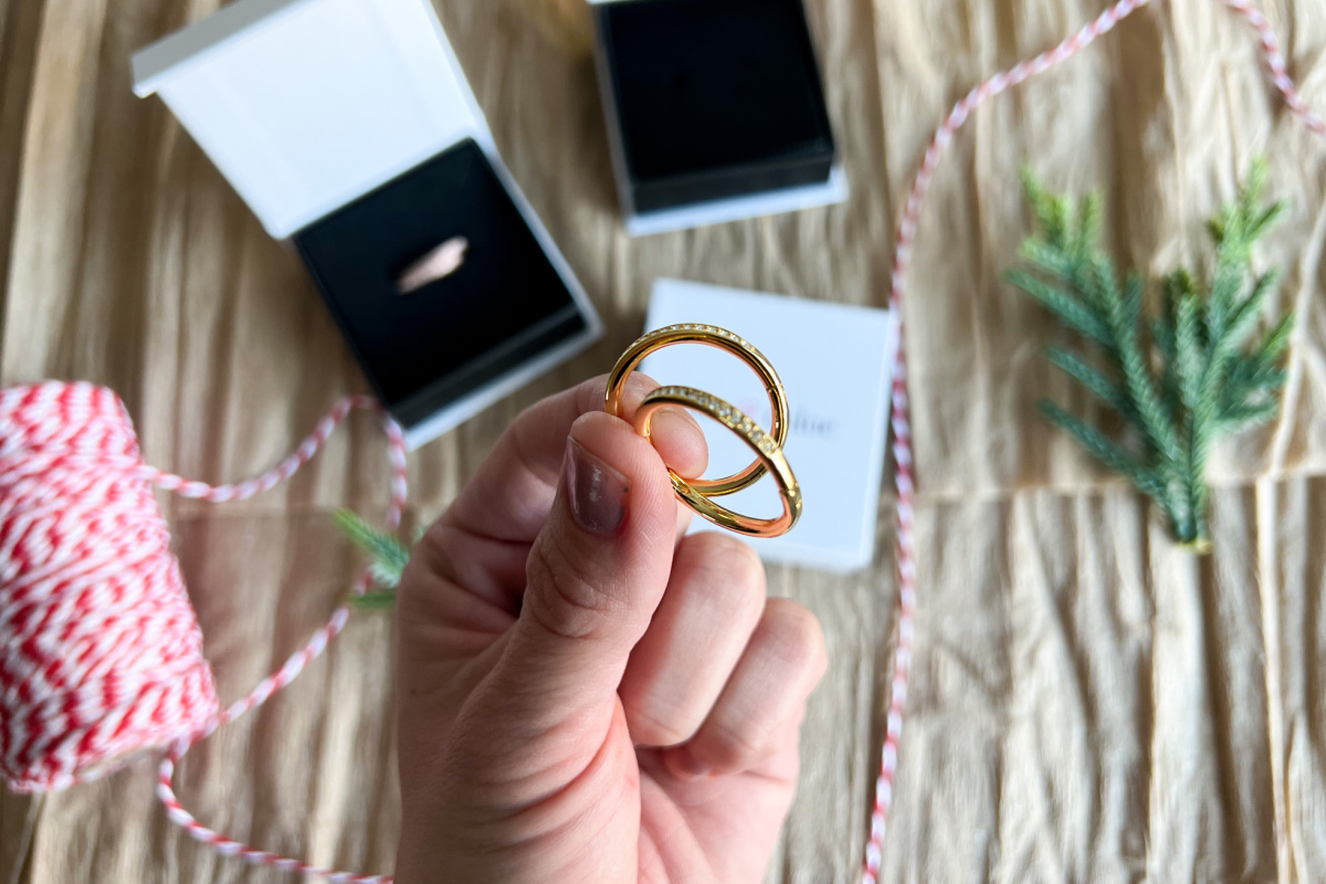 hoop earrings in hand