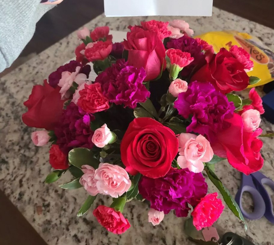 close up of pink and red bouquet of flowers 