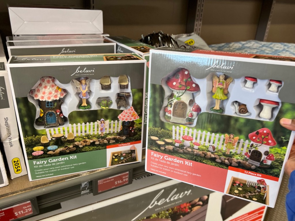 woman holding fairy garden kits