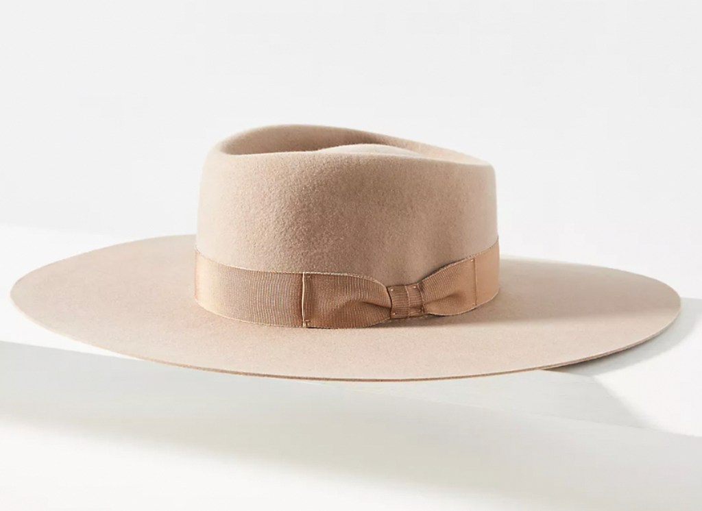 stock photo of beige rancher hat with white background
