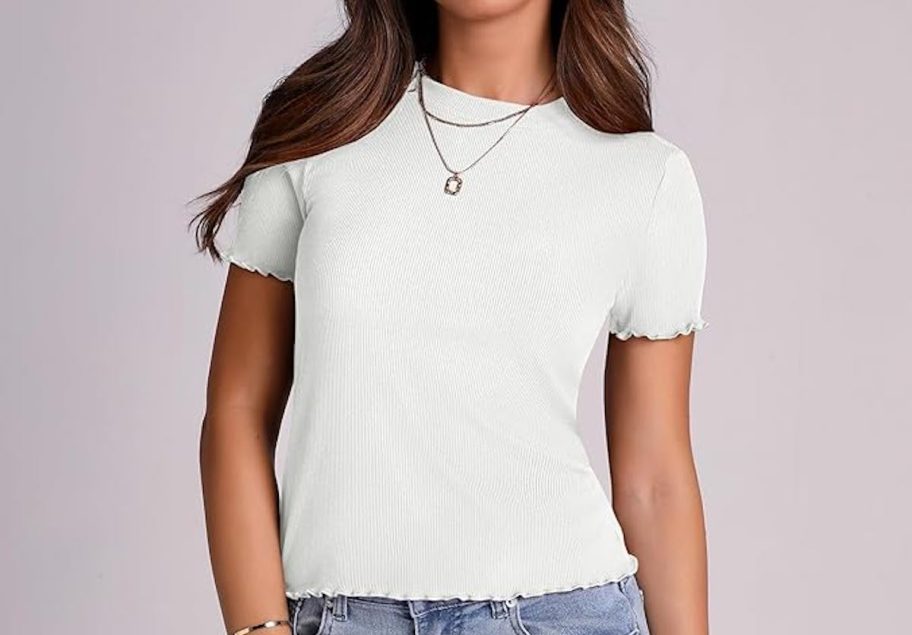 woman wearing white ruffle tee shirt