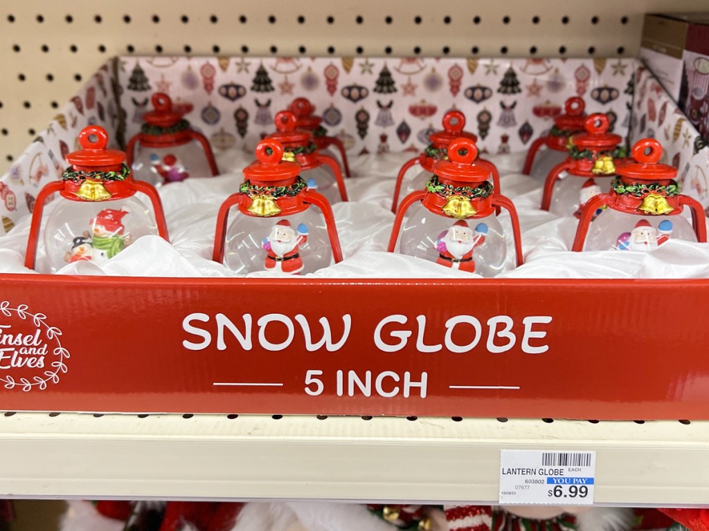 box full of lantern shaped snow globes