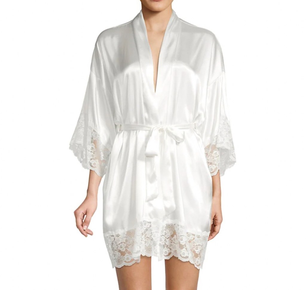 stock photo of woman wearing white silk robe with lace