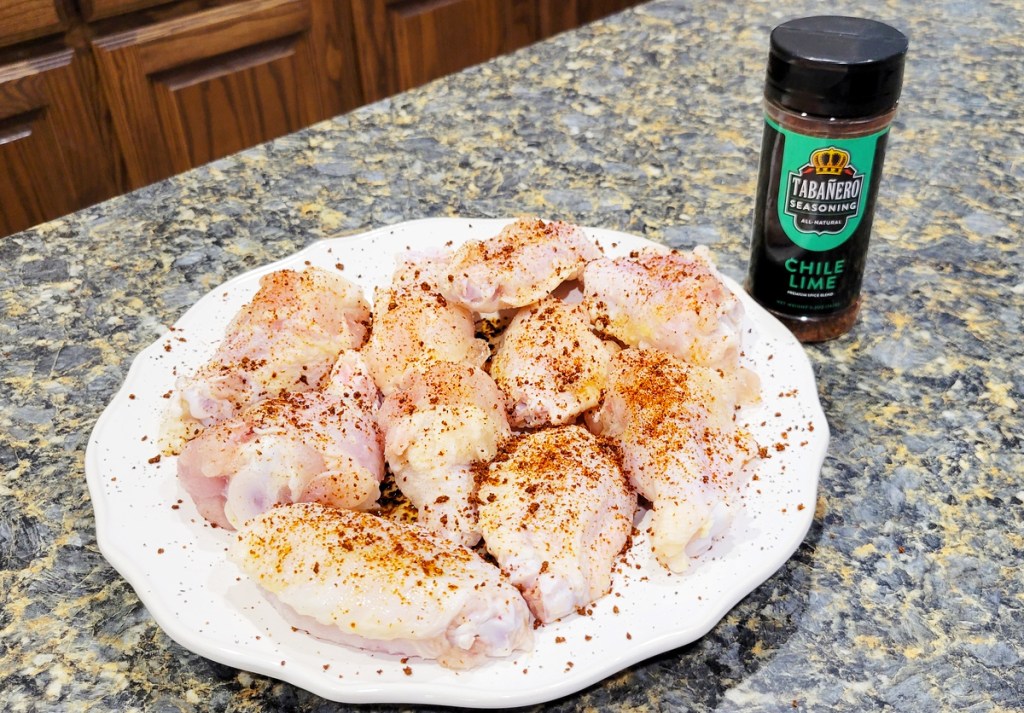 Tabañero Chili Lime Seasoning on raw chicken