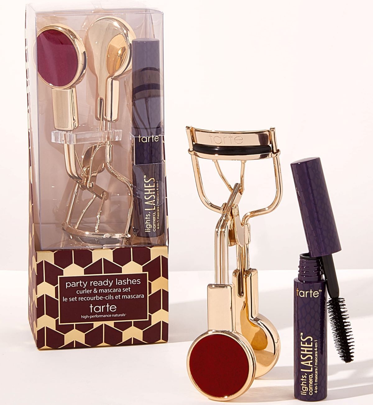 Tarte eyelash curler and mascara next to a set with both items in it