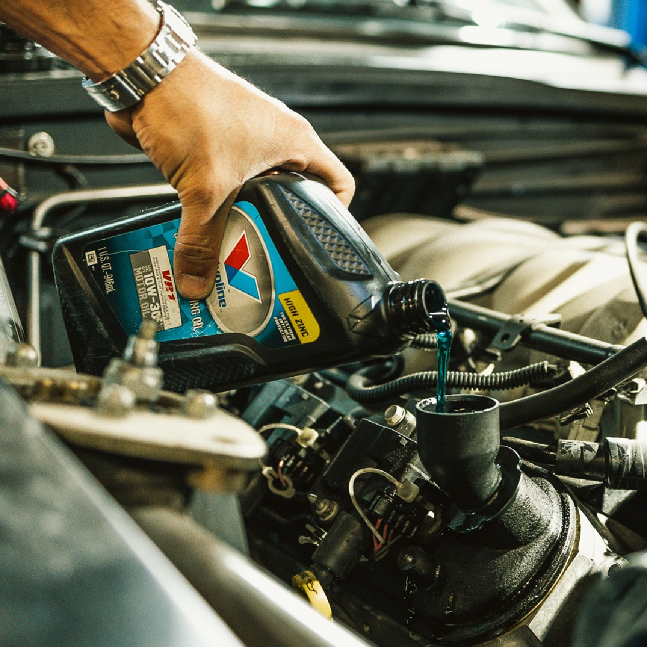 man performing a valvoline oil change