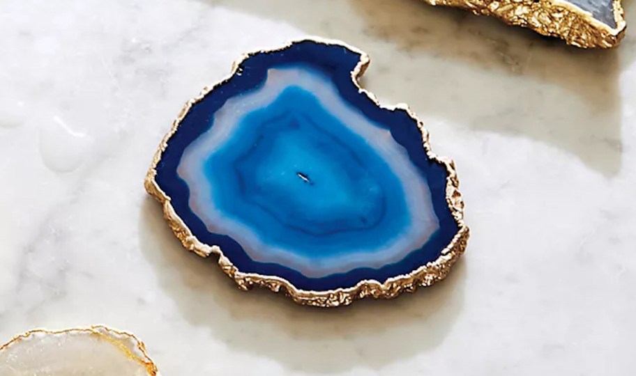 blue agate coaster on marble counter