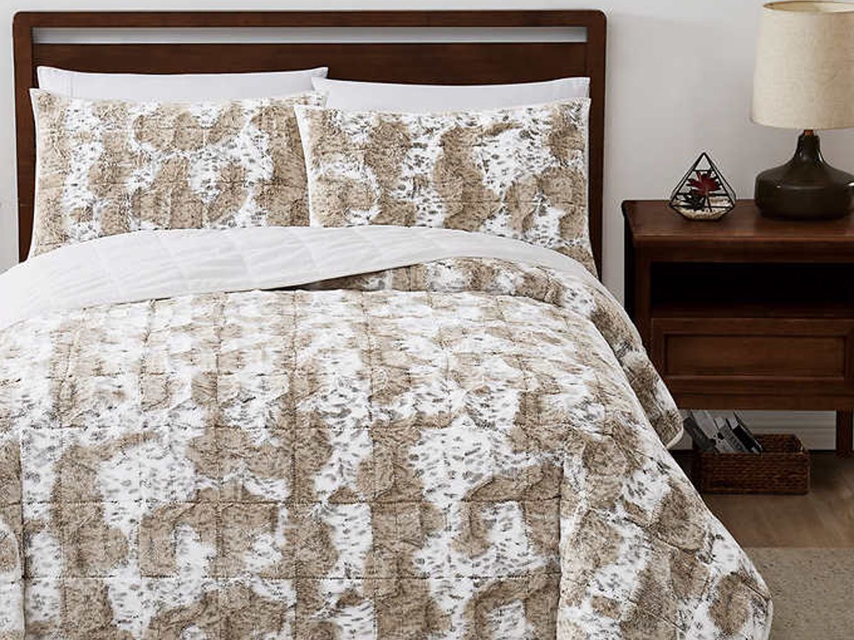 beige comforter set on bed