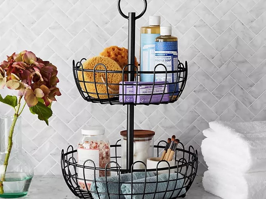 2 tier wire basket full of bath products on counter
