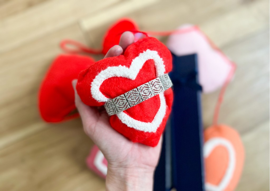 bracelet over heart pillow