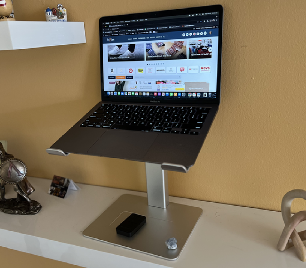 An ergonomic adjustable height computer stand