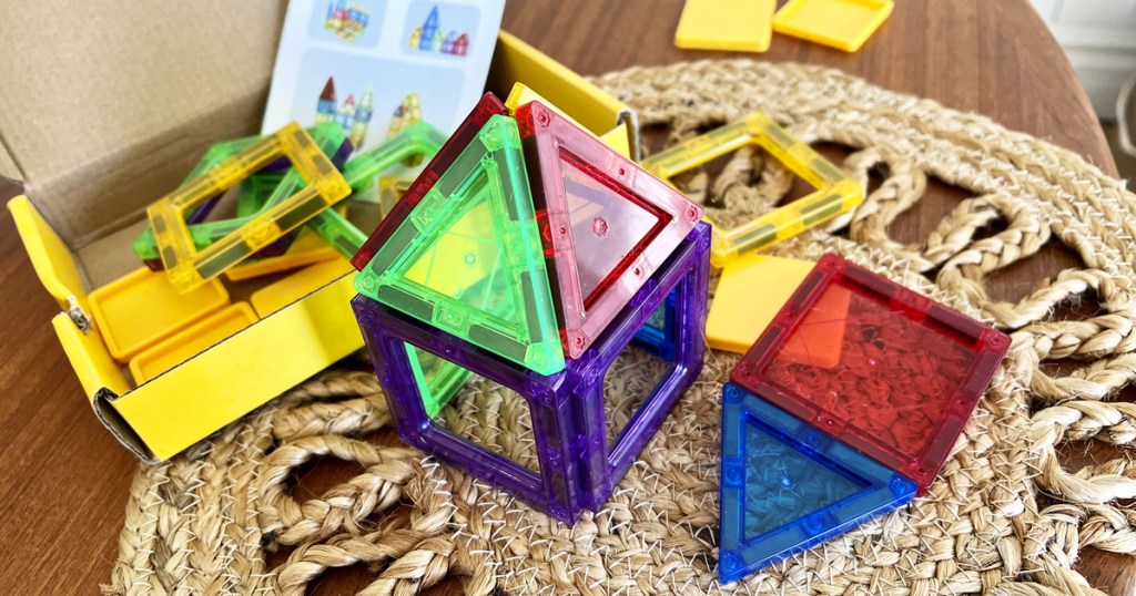 colorful magnetic tiles on placemat on a table