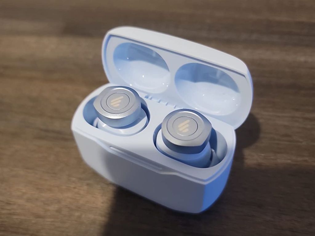 very light blue earbuds in blue case