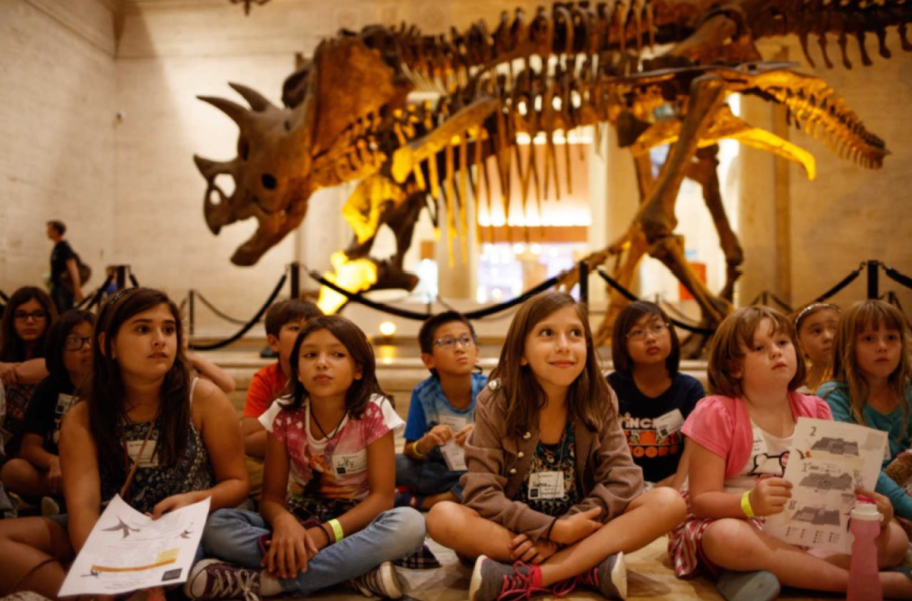 Children in the dinosaur exhibit at the Natural History Museum of Los Angeles County