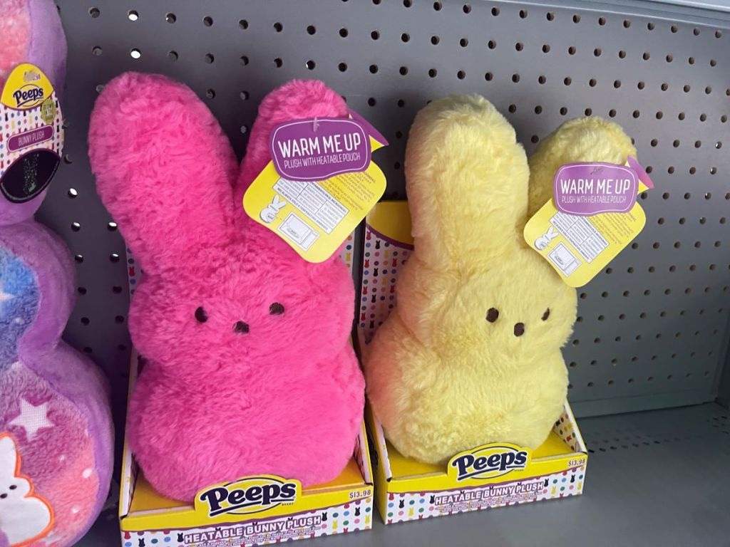 Two Peeps plush in boxes on a shelf at the store