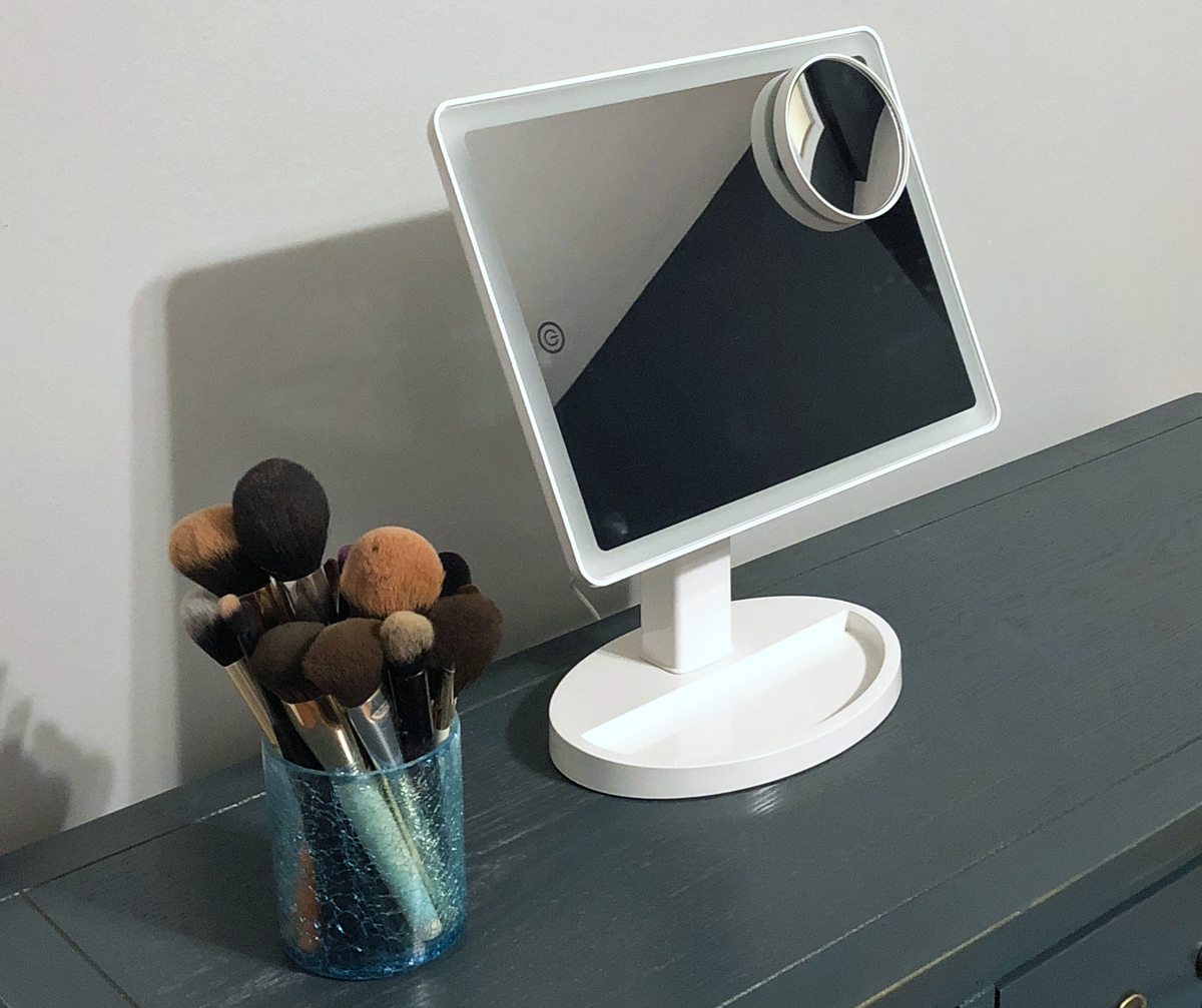 lighted makeup mirror on vanity