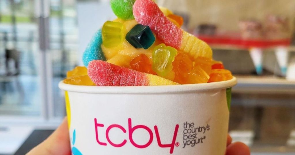 cup of frozen yogurt from TCBy covered in gummy bears and gummy worms