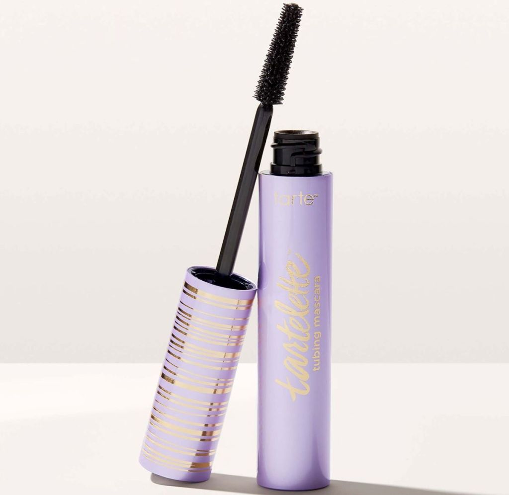 Tartelette Tubing Mascara with the application wand leaning against the tube.