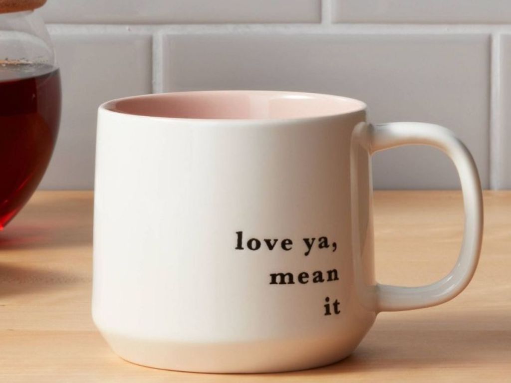 Threshold Coffee Mug that says "Lova ya, mean it."