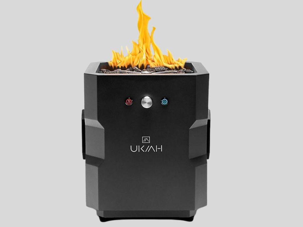 Ukiah firepit speaker wtih flame coming out of the firepit