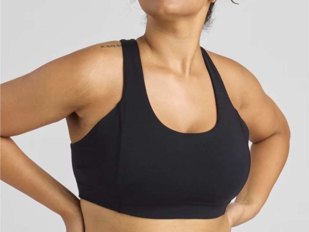 A woman wearing a sports bra