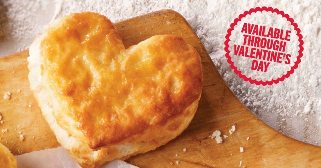 heart shaped biscuit on wooden cutting board