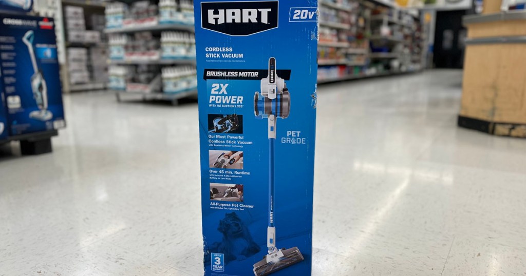 Hart 20-volt cordless stick vaccum on floor in aisle in walmart store