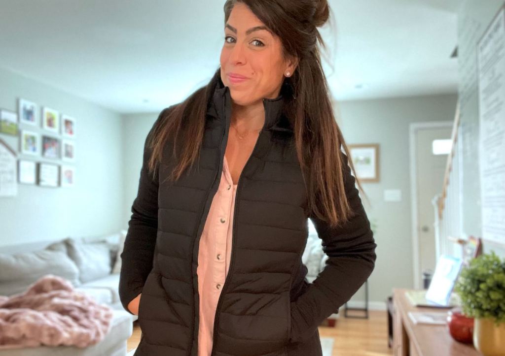 woman posing in black jacket