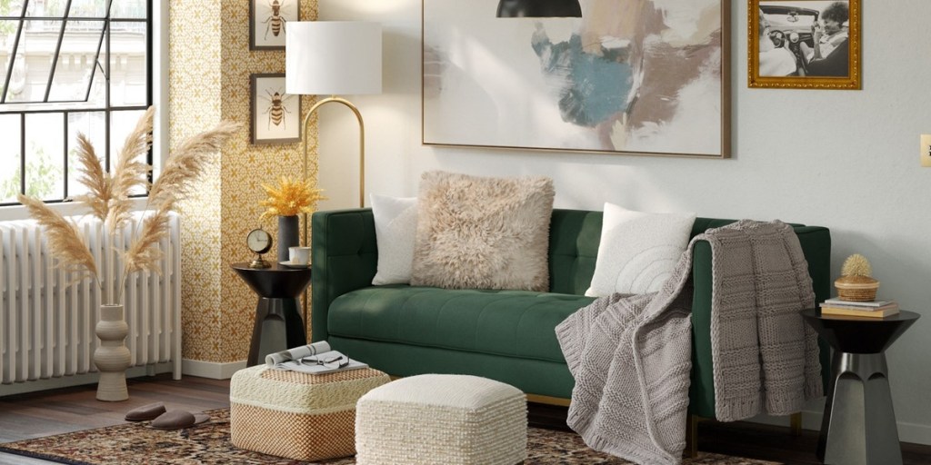 apartment furnished with a green couch and neutral accents